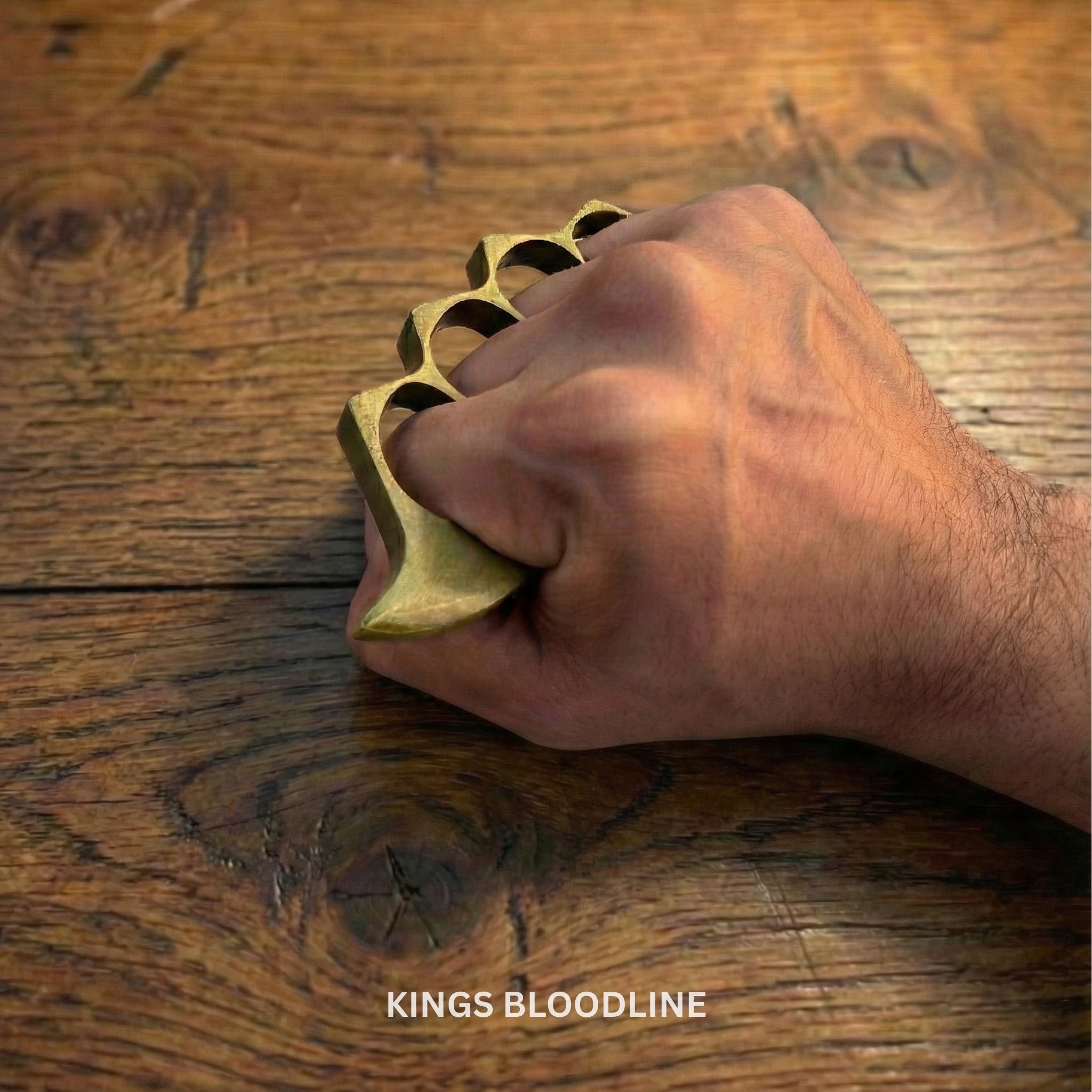 Brass knuckle duster on hands