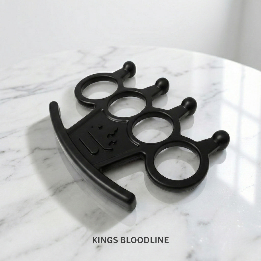 Black knuckle on white marble surface side view