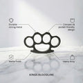 Black knuckle duster with features listed on a gray background