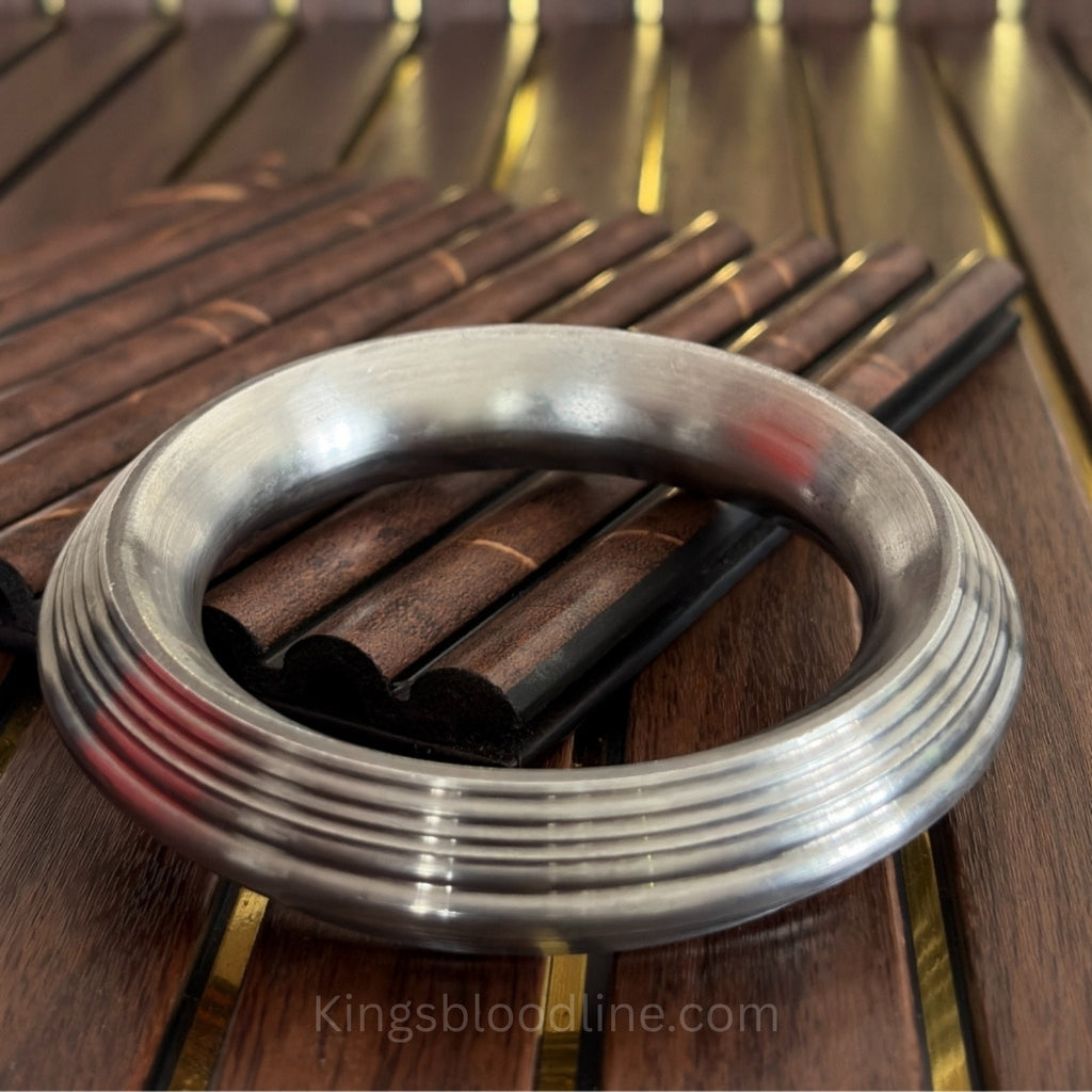 Sarbhloh  Heavy Stripe kada on wooden table