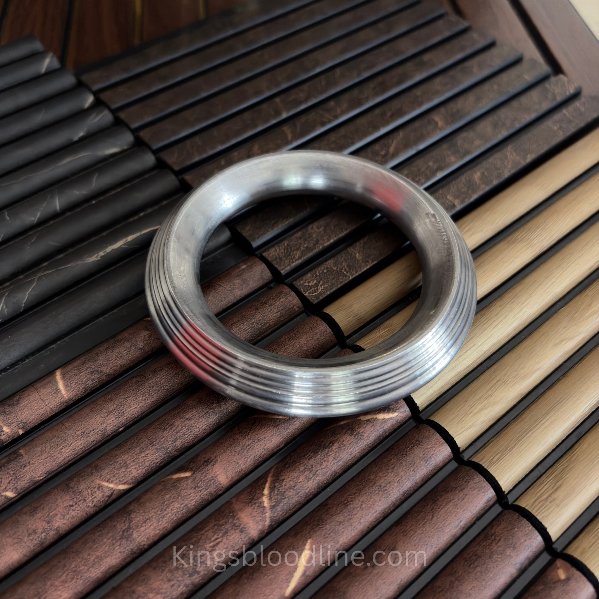 Sarbhloh  Heavy Stripe kada on wooden table 2