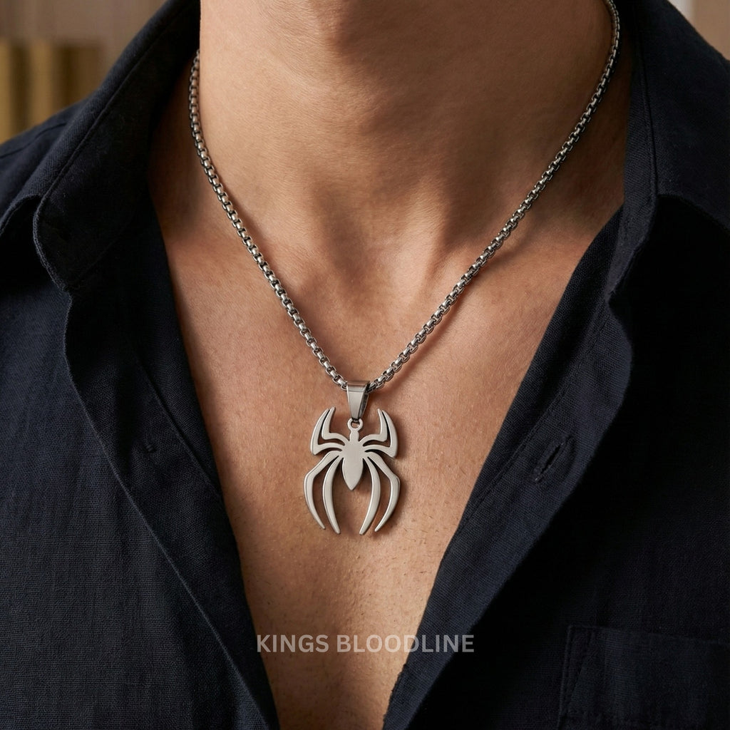 Spider necklace worn by a person with a blurred background