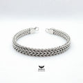 Titanium steel bracelet on white background